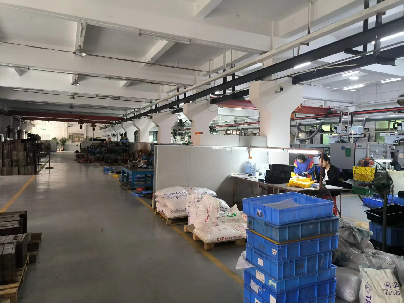 Materials and goods staged inside a figure and toy factory
